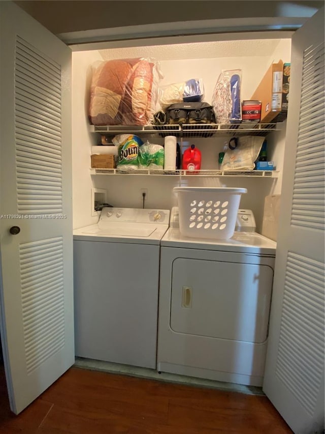 4460 NW 107th Ave Unit 303-8, Doral, FL 33178 - washroom featuring separate washer and dryer and wood finished floors