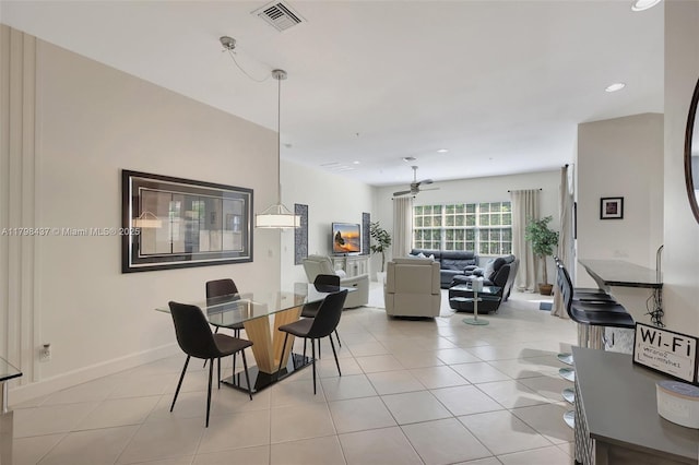 dining area featuring light tile patterned flooring, baseboards, recessed lighting, and a ceiling fan