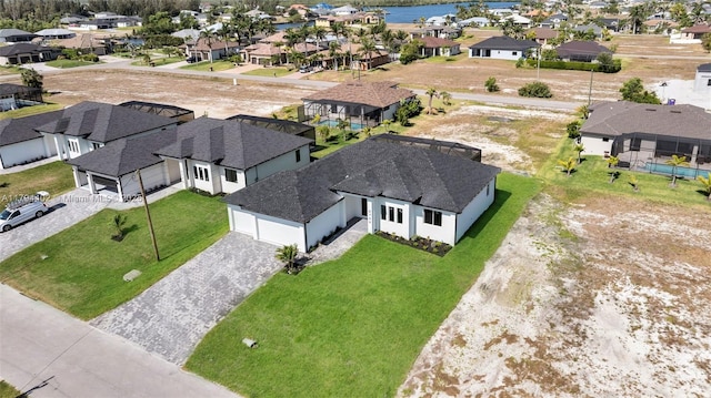 1212 NW 35th Pl, Cape Coral, FL 33993 - aerial view of residential area with a nearby body of water