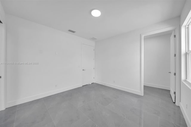 1212 NW 35th Pl, Cape Coral, FL 33993 - spare room with baseboards