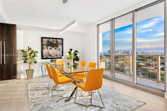 1180 N Federal Hwy Unit 1407, Fort Lauderdale, FL 33304 - dining space with a wall of windows and a skyline view