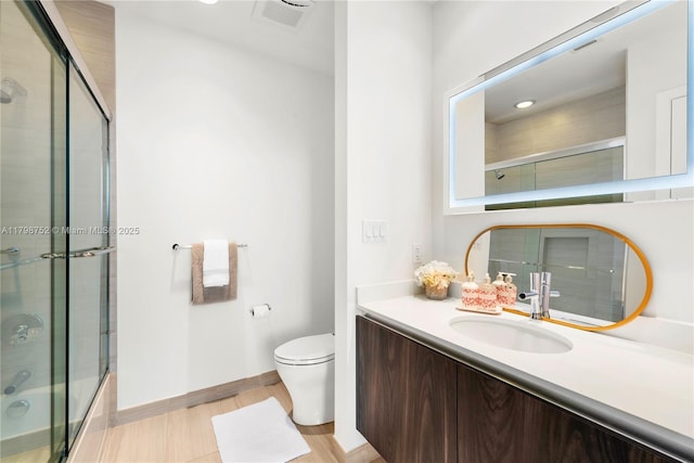 1180 N Federal Hwy Unit 1407, Fort Lauderdale, FL 33304 - full bath with toilet, vanity, baseboards, and shower / bath combination with glass door