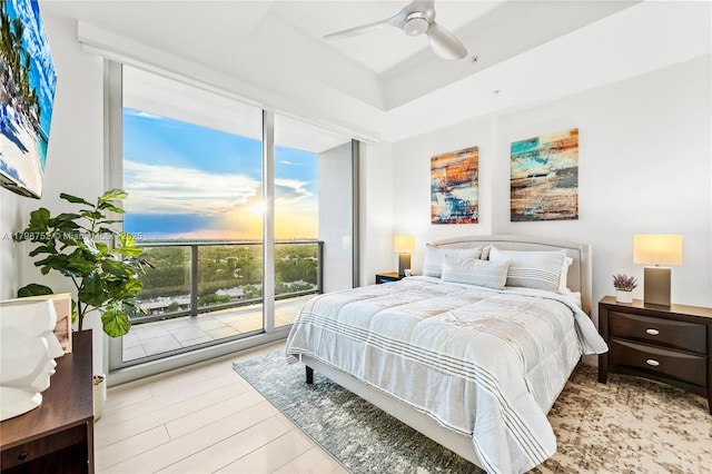 1180 N Federal Hwy Unit 1407, Fort Lauderdale, FL 33304 - bedroom featuring multiple windows, access to outside, ceiling fan, and expansive windows