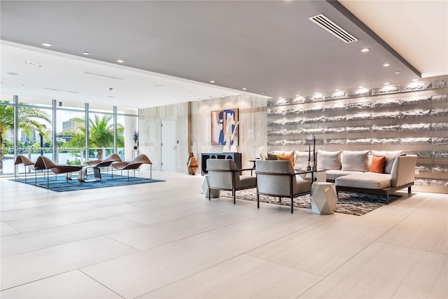 1180 N Federal Hwy Unit 1407, Fort Lauderdale, FL 33304 - building lobby with a wall of windows and recessed lighting