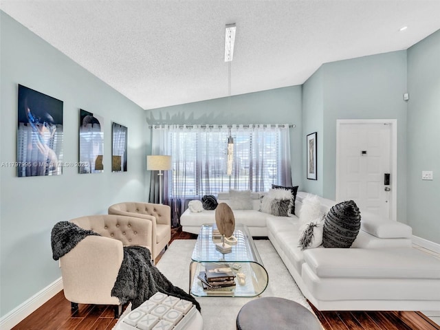 5206 NW 99th Ave, Sunrise, FL 33351 - living room with lofted ceiling, wood finished floors, baseboards, and a textured ceiling
