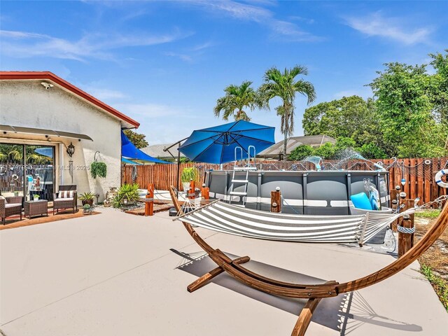 5206 NW 99th Ave, Sunrise, FL 33351 - view of patio / terrace with a fenced backyard