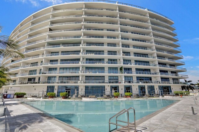community pool with a patio