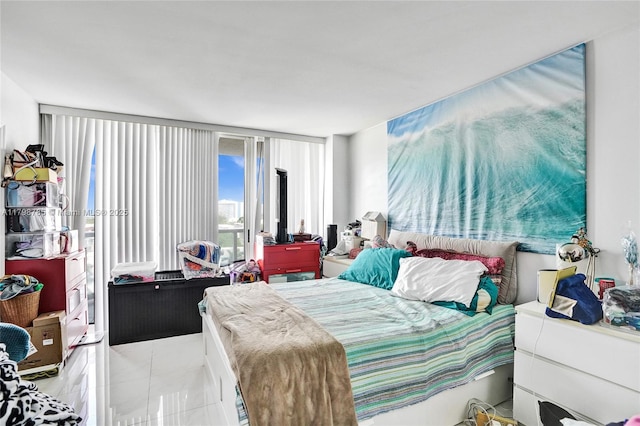 7330 Ocean Ter Unit 8-C, Miami Beach, FL 33141 - bedroom with light tile patterned flooring