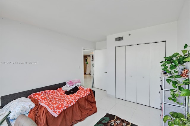7330 Ocean Ter Unit 8-C, Miami Beach, FL 33141 - bedroom with a closet and light tile patterned flooring