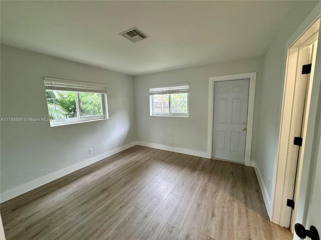 2641 SW 13th Ave, Fort Lauderdale, FL 33315 - spare room featuring wood finished floors and baseboards