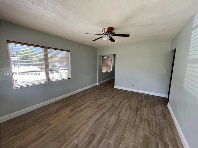 2641 SW 13th Ave, Fort Lauderdale, FL 33315 - unfurnished room featuring dark wood finished floors, ceiling fan, baseboards, and a textured ceiling