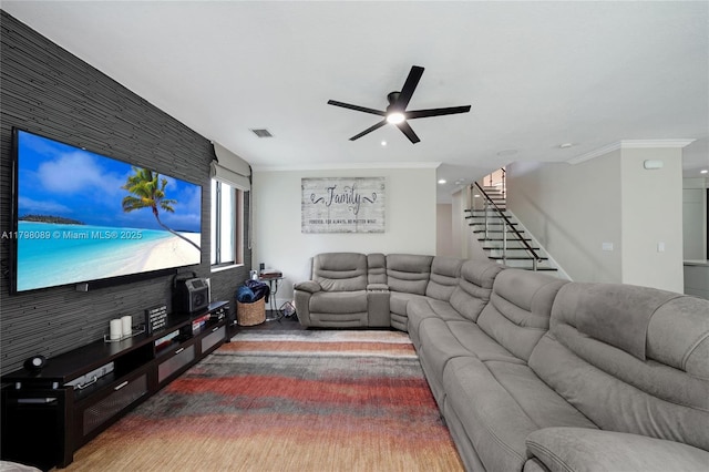 living area featuring ceiling fan, stairway, ornamental molding, and recessed lighting