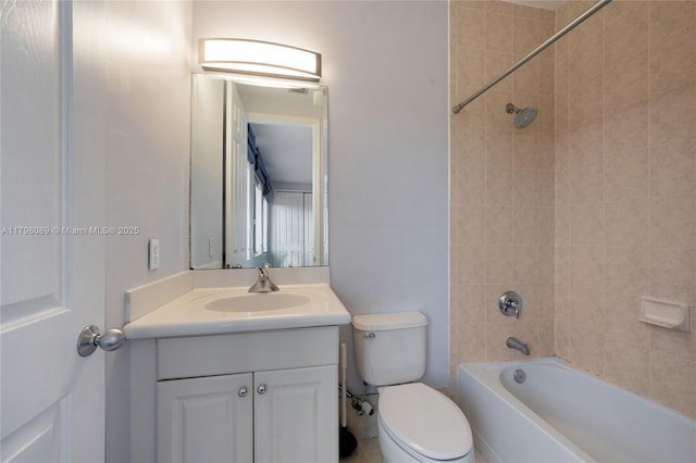 bathroom featuring vanity, toilet, and shower / bathtub combination