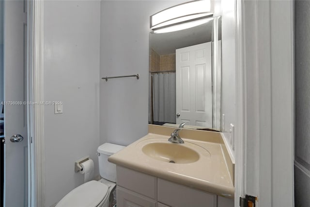 full bath with vanity and toilet