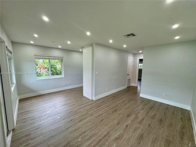 2631 SW 13th Ave, Fort Lauderdale, FL 33315 - empty room with recessed lighting, baseboards, and wood finished floors