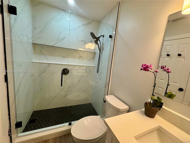 2631 SW 13th Ave, Fort Lauderdale, FL 33315 - bathroom with a marble finish shower, toilet, and vanity