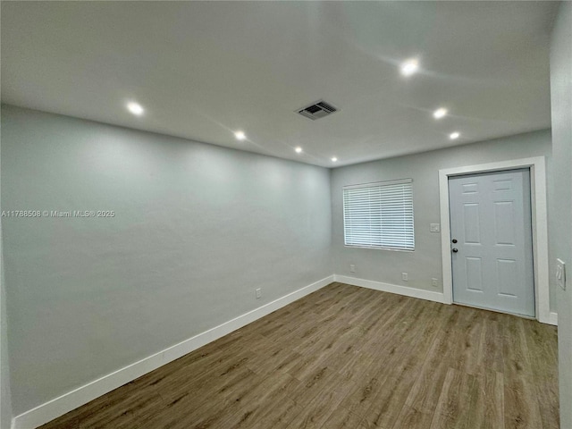 2631 SW 13th Ave, Fort Lauderdale, FL 33315 - empty room with wood finished floors, baseboards, and recessed lighting