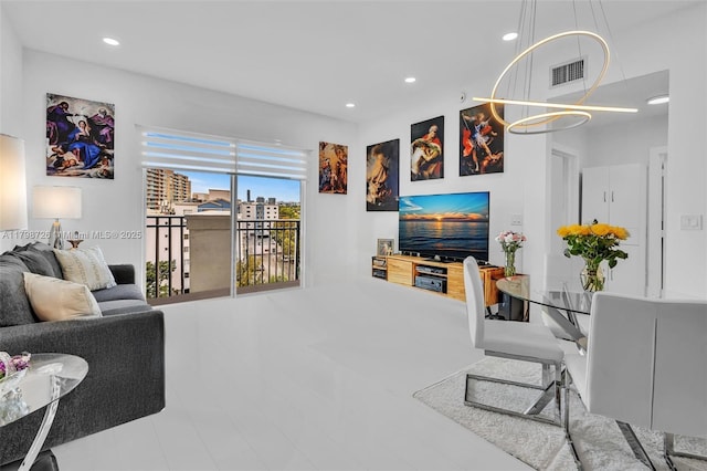 2650 SW 37th Ave Unit 906, Miami, FL 33133 - tiled living area featuring a chandelier and recessed lighting