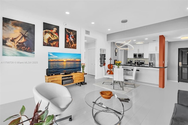 2650 SW 37th Ave Unit 906, Miami, FL 33133 - living room featuring recessed lighting and baseboards