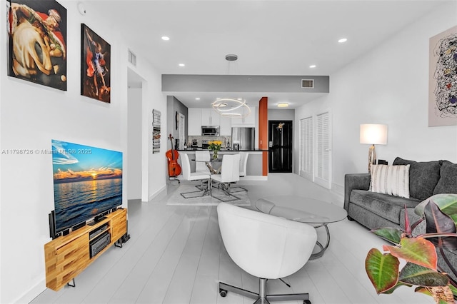 2650 SW 37th Ave Unit 906, Miami, FL 33133 - living room featuring recessed lighting and baseboards