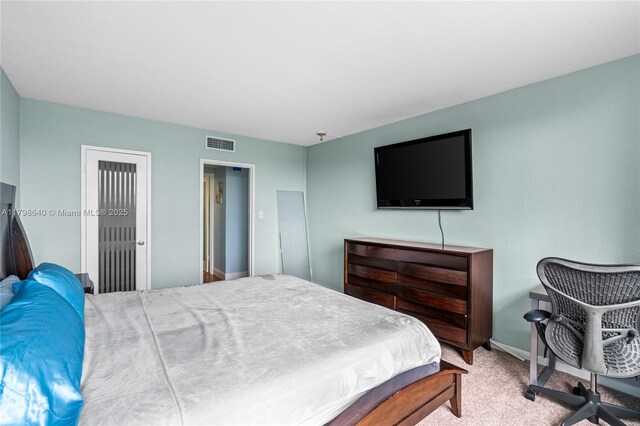 1000 W Ave Unit 308, Miami Beach, FL 33139 - carpeted bedroom featuring baseboards and a closet