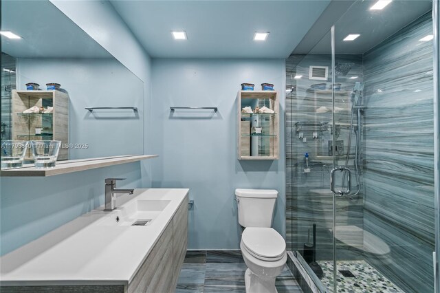 1000 W Ave Unit 308, Miami Beach, FL 33139 - bathroom with toilet, a stall shower, and vanity