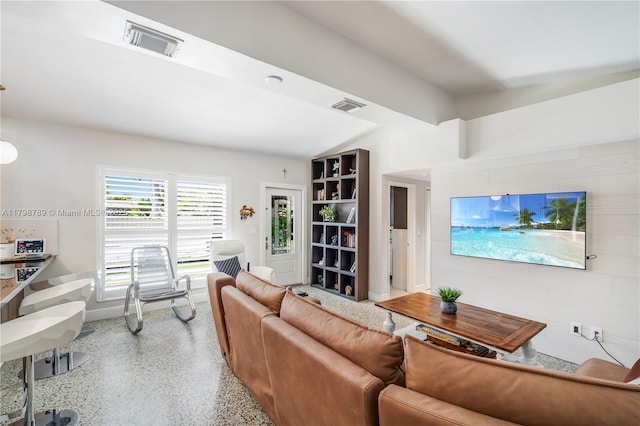 living room with speckled floor