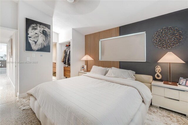 1245 NE 154th St, North Miami Beach, FL 33162 - bedroom with a spacious closet, baseboards, and a closet