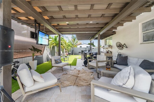 1245 NE 154th St, North Miami Beach, FL 33162 - view of patio / terrace with an outdoor living space and a fenced backyard