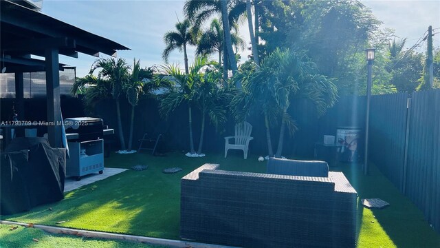 1245 NE 154th St, North Miami Beach, FL 33162 - view of patio featuring a grill