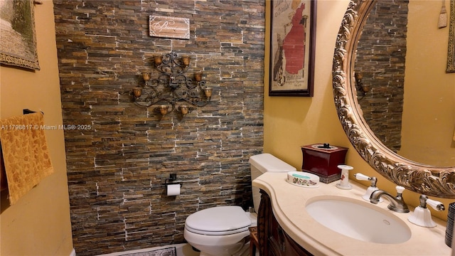 half bath with toilet and vanity