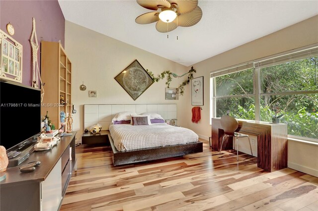 95 E Westwood Cir E, West Palm Beach, FL 33411 - bedroom featuring light wood-style floors, baseboards, and ceiling fan