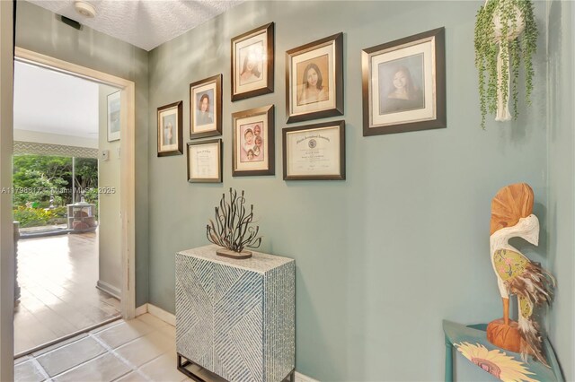 95 E Westwood Cir E, West Palm Beach, FL 33411 - entryway featuring light tile patterned floors and baseboards