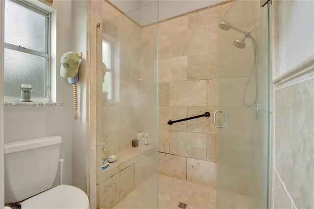 95 E Westwood Cir E, West Palm Beach, FL 33411 - bathroom with a stall shower and toilet