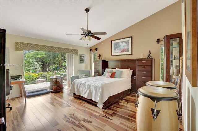 95 E Westwood Cir E, West Palm Beach, FL 33411 - bedroom featuring lofted ceiling, light wood-type flooring, access to exterior, and a ceiling fan