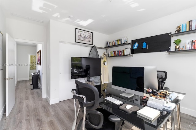 2475 NE 135th St, North Miami, FL 33181 - office featuring wood finished floors and baseboards