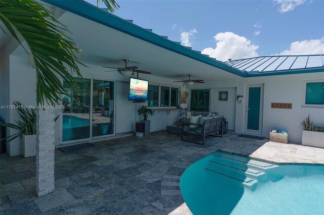 2711 NE 57th Ct, Fort Lauderdale, FL 33308 - swimming pool featuring ceiling fan, a patio area, and an outdoor hangout area