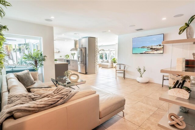 2711 NE 57th Ct, Fort Lauderdale, FL 33308 - living area with light tile patterned floors and recessed lighting