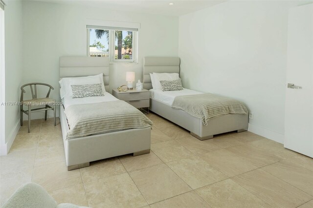 2711 NE 57th Ct, Fort Lauderdale, FL 33308 - bedroom with baseboards, recessed lighting, and light tile patterned flooring