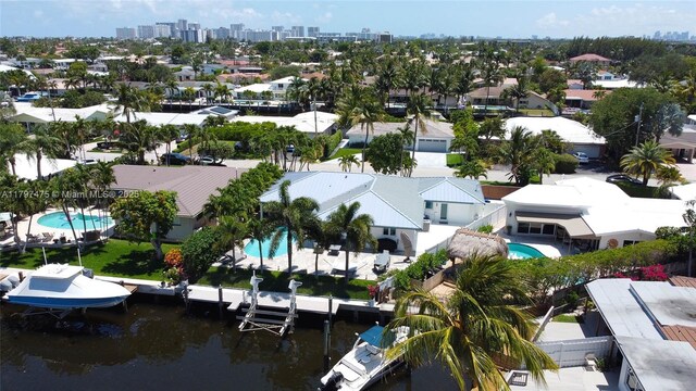 2711 NE 57th Ct, Fort Lauderdale, FL 33308 - aerial perspective of suburban area featuring a pool area and a large body of water