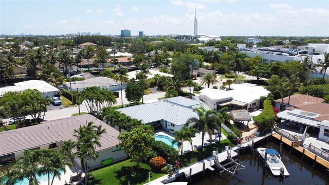 2711 NE 57th Ct, Fort Lauderdale, FL 33308 - aerial perspective of suburban area featuring a pool area and a large body of water