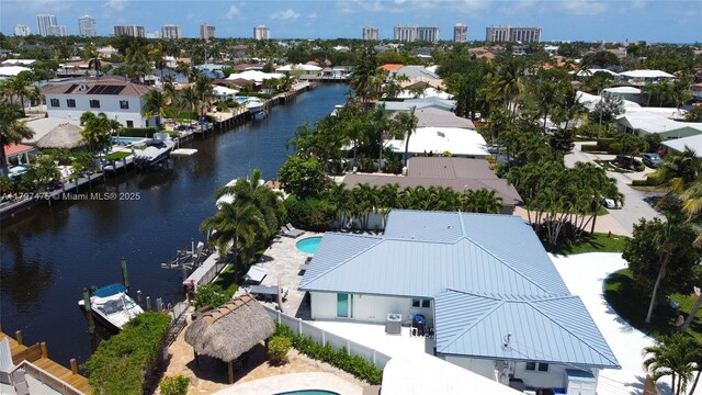 2711 NE 57th Ct, Fort Lauderdale, FL 33308 - aerial view of residential area featuring a nearby body of water and a skyline view
