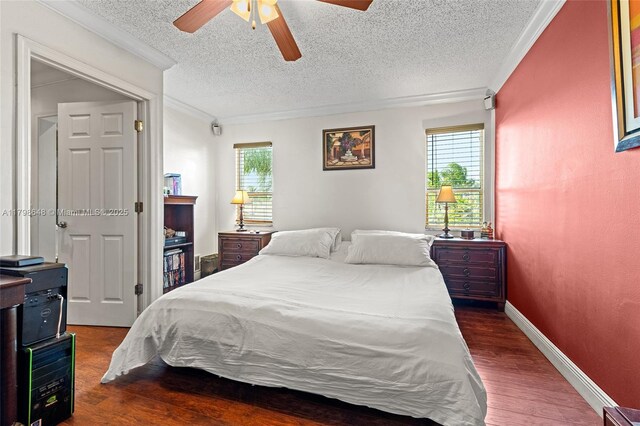 3865 NW 1st Pl, Deerfield Beach, FL 33442 - bedroom featuring a textured ceiling, crown molding, multiple windows, dark wood-style flooring, and a ceiling fan