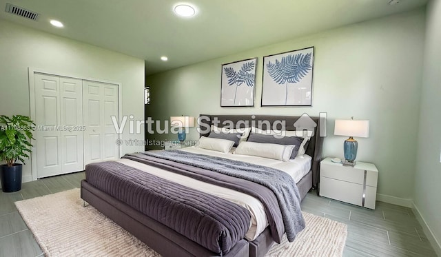 2615 68th St W, Lehigh Acres, FL 33971 - bedroom featuring baseboards, a closet, and recessed lighting