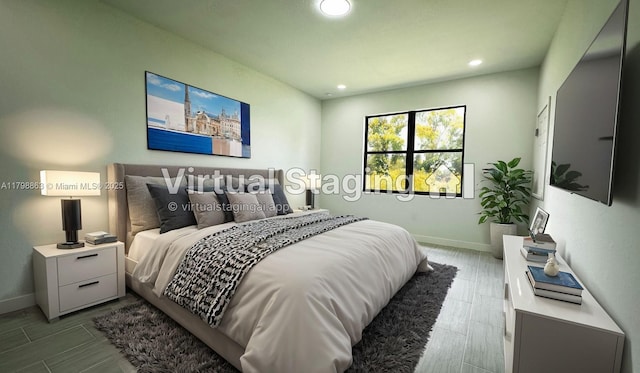 2615 68th St W, Lehigh Acres, FL 33971 - bedroom with baseboards, recessed lighting, and wood finish floors