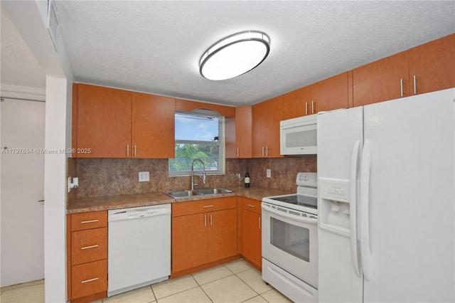 6650 Royal Palm Blvd Unit 206C, Margate, FL 33063 - kitchen featuring white appliances, a sink, backsplash, a textured ceiling, and brown cabinets