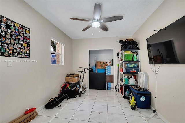 storage area with a ceiling fan