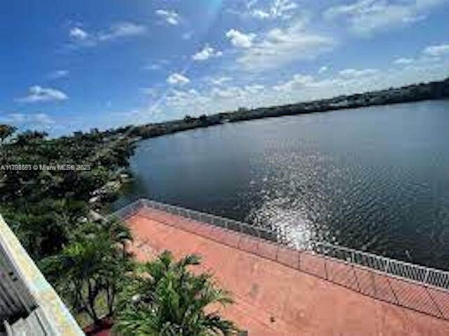 water view featuring fence