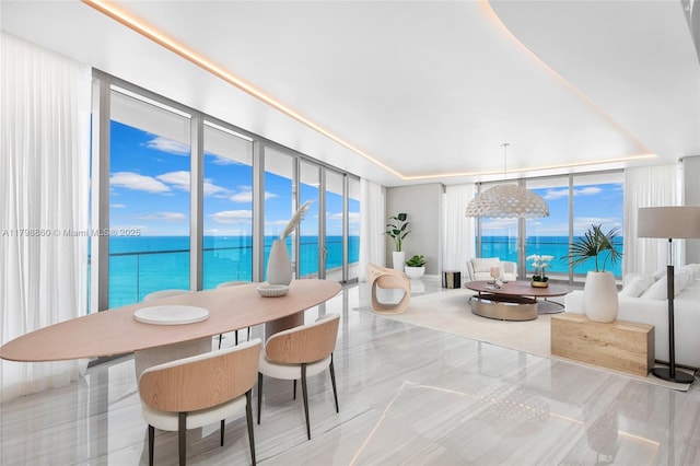 dining room with a water view