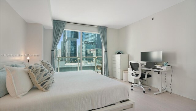 55 SE 6th St Unit 1804, Miami, FL 33131 - bedroom with wood finished floors